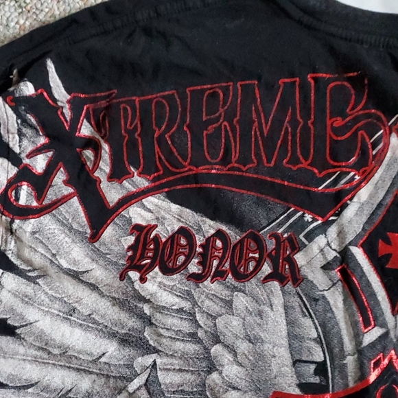 Affliction - Picture 3 of 5